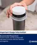 Hand holding PiMag Aqua Pour Filter Cartridge No Fuss Replacement With Copper Particles, Activated Carbon For pH Balance