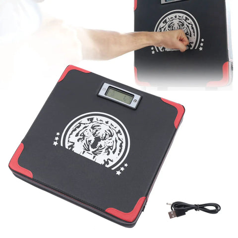 Rock Solid Wall Mounted Boxing Punch Force Tester Durable Multi Layer Striking Pad For Home Gym Knockout Power Gauge And Hand Strike Analyzer For Legit Workout Sessions Travel Ready Fitness Gear with digital display and black surface.