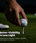 Reflective Golf Ball Tracking Dots For Launch Monitors And Golf Simulators 200 Pack on golf ball on tee in low light