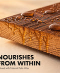 Real Deal Clear Wood Sealer And Tough Water Based Hardwax Oil That Soaks Deep Into Raw Timber To Deliver Bulletproof Weather Shielding With Zero Flake Mess In One Quart, showcasing water droplets on a finished wood surface.