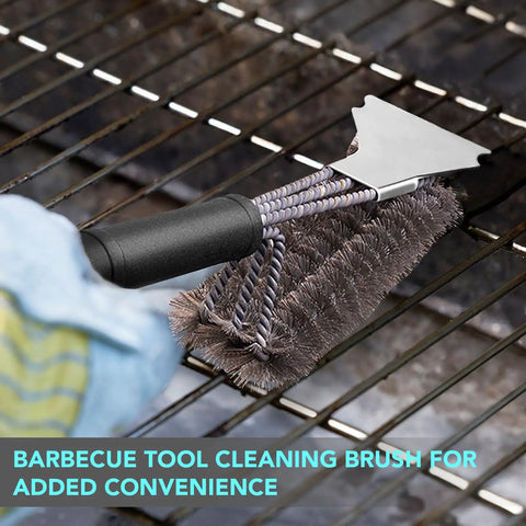 Heavy duty wire brush from Backyard BBQ Essential 5 Piece Grill Tools Set with cleaning cloth on grill