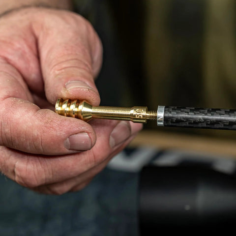 Hand assembling Caliber 50 Muzzleloader Cleaning Kit with Caliber Specific Bronze Bore Brush Pierce Point Jag Slotted Tip