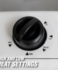 Close-up of the temperature control dial on a 10,000 BTU Vent Free Radiant Propane Heater With Piezo Ignition, shows heat settings.