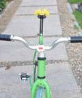 Grippy Leather Double Lock On Bike Grips 22.2mm For Mountain And Road Bikes mounted on a green bike with curved handlebars