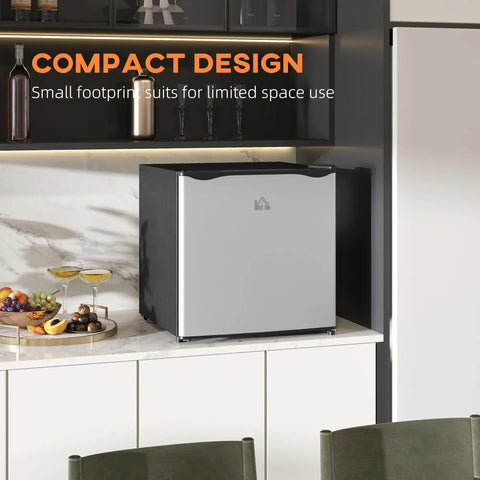 Keep Your Stash Ice Cold With This Sick 1.1 Cu Ft Countertop Freezer That Masters Tiny Spaces For Dorm Rooms And Apartments While Delivering Crisp Adjustable Cooling And Modern Silver Style on kitchen counter, compact design.