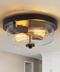 Brushed Nickel Two Light Flush Mount Ceiling Fixture With Seeded Glass Shade for Indoor Outdoor Use in a modern kitchen setting