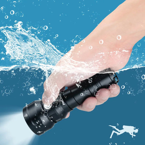 Hand holding the Beast Mode Underwater Dive Flashlight With 2000 Lumens, emitting light underwater, demonstrating waterproof feature.