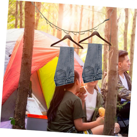 Outdoor Clothesline Rope Kit For Camping And Travel Non Slip Quick Fastening Drying Line with jeans hanging near tent