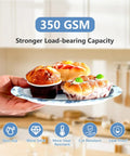 Awesome Blueberry Party Supplies 200 Piece Disposable Tableware Set with 350 GSM plates holding assorted baked goods.