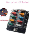 10 Way RV Blade Fuse Block With Bright LED Indicator DC Junction Box supplying 100 Amp kickass protection cover showing fuses and LED indicators.