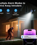 4MP HD Plug In Outdoor Security Camera With Dual Band WiFi illuminating intruder with spotlight, phone notification visible