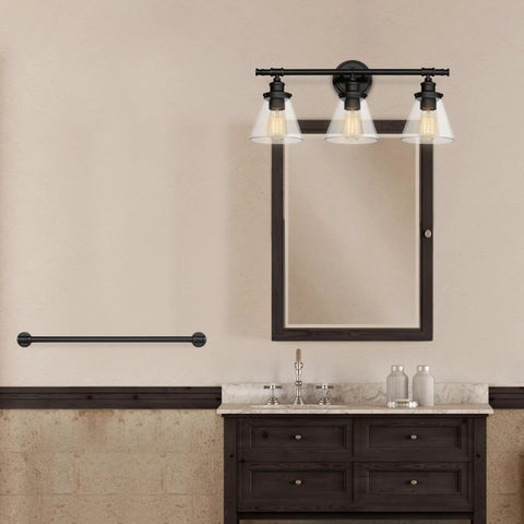 Oil Rubbed Bronze All In One Bathroom Set With 3 Light Vanity Fixture and Coordinating Towel Bar above dark wood vanity