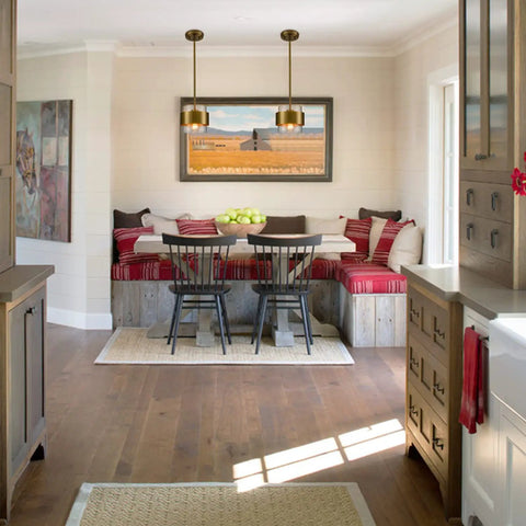 Dining area with two Dope Modern Brass Pendant Lights With Clear Glass Shade, adjustable height, in a contemporary kitchen