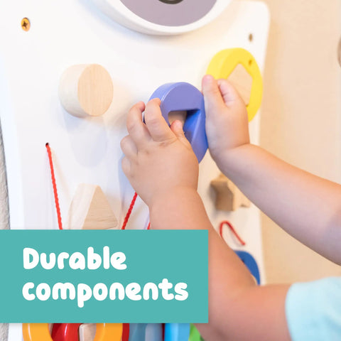 Toddler using Zebra Activity Wall Panel For Toddlers Ages 18 Months Plus Montessori Sensory Toy with nesting shape activity.