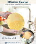 Person cleaning a silicone basket from All-In-One Sourdough Starter Kit With Silicone Proofing Baskets And Jar, water running