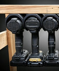Top Shelf Power Tool Hanging Bracket With Slick Slide In Cabinet Mount For Drills And Impact Drivers Compatible With Porter Cable Heavy Duty Workshop Gear Holder Holds Two Pieces Built Tough secured with three drills on a wooden shelf.