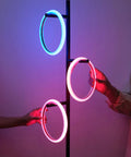 RGB Color Changing Floor Lamp With Tall Tree Design showing glowing rings with smooth gradient in matte black finish