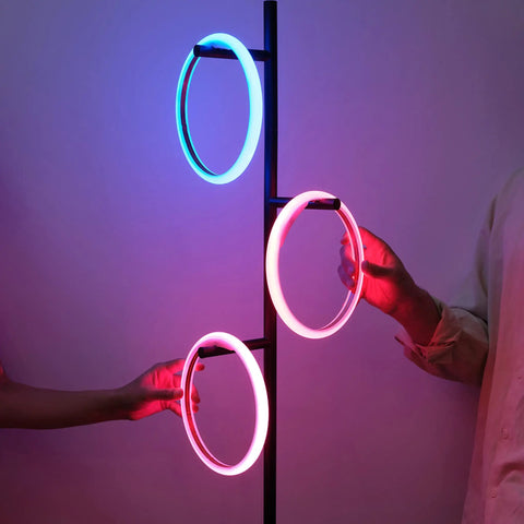 RGB Color Changing Floor Lamp With Tall Tree Design showing glowing rings with smooth gradient in matte black finish