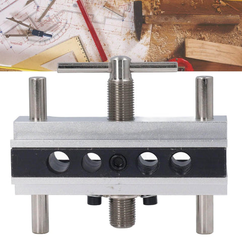 Self Centering Doweling Jig Kit With Adjustable Width Drilling Guide And Six Bushings, Universal Wood Thickness Range 0.4 To 2.4 Inches, Compatible With 6, 8, 10 And 12 Mm Dowels, Silver Finish, front view on workbench.