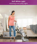 Woman vacuuming living room under soft white light of A19 Led Light Bulb Non Dimmable 800 Lumens Bright Soft White 2700K 10W Equivalent 60W E26 Base