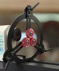Rock Solid Woodturning Steady Rest For 12 14 And 16 Inch Swing Lathes, featuring black steel frame with three red rollers for stability.