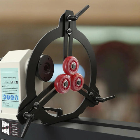 Rock Solid Woodturning Steady Rest For 12 14 And 16 Inch Swing Lathes, featuring black steel frame with three red rollers for stability.