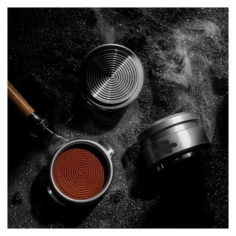 Top Shelf Espresso Tamper And Coffee Distributor Combo With Dual Stainless Ripple Blades For Dead On Bed Leveling Fits All 51Mm 53Mm And 58Mm Portafilters Sick Quality Barista Essentials Kit with a wooden handle and coffee grounds.