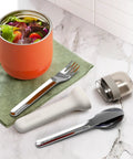 Pocket Utensil Set In Grey With 18/8 Stainless Steel Fork Knife And Spoon Nestled In A Compact Case For Travel, shown with salad bowl.