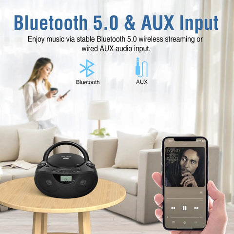 Portable CD Player Bluetooth Boombox with AM/FM Radio displayed with smartphone on table in living room