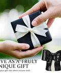 Black Coquette Bow Toilet Bolt Covers Set Of Two - Durable Ceramic Screw Nut Caps For Bathrooms - Cute Replacement Parts With A Total Vibe Upgrade To Slay Your Home Decor Goals Today, featuring a gift box with a bow.