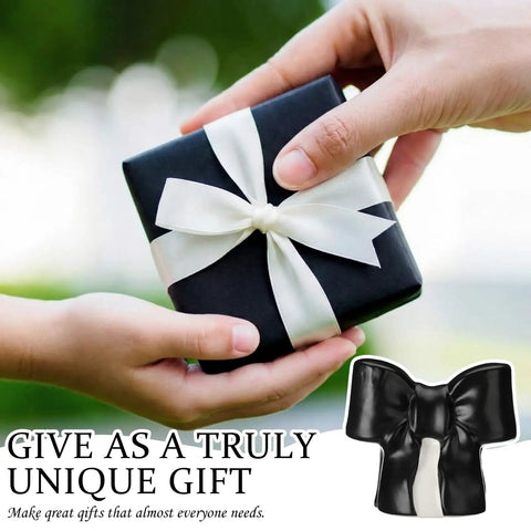 Black Coquette Bow Toilet Bolt Covers Set Of Two - Durable Ceramic Screw Nut Caps For Bathrooms - Cute Replacement Parts With A Total Vibe Upgrade To Slay Your Home Decor Goals Today, featuring a gift box with a bow.