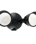 Badass Heavy Duty Dual Head Led Exterior Flood Light With 45 Watt Power And 5500 Lumens Kickin Brightness mounted on a wall.
