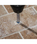 Natural Stone Tile Drill Set Four Piece With Multigrind Head in use drilling brown tile