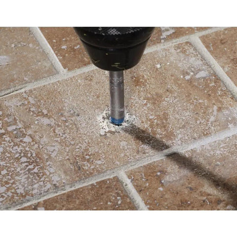 Natural Stone Tile Drill Set Four Piece With Multigrind Head in use drilling brown tile