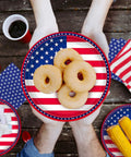 Patriotic American Flag Party Supplies Party Pack Includes 50 Dinner Plates 50 Stars Napkins And 50 Stripes Napkins visible at table