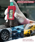 Digital Tire Tread Depth Gauge With Three Modes And Color Coded Scale for quick easy readouts, shown in use with colorful display.