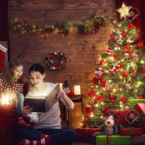 Cozy holiday scene with family reading by a decorated Christmas tree, showcasing warm fairy lights enhancing the festive atmosphere.