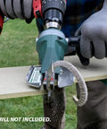 Close-up of Snapper Shear Siding Pro Cordless Drill Attachment cutting fiber cement siding, powered by an 18V drill, outdoor use.