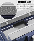 Purezmoto small fixed woodworking table vise, blue metal body with diamond-pattern hardened jaws, 5in/125mm (close-up).