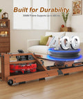 Water Rowing Machine For Home Gym With Wooden Frame And 400 Lbs Capacity shown in a living room setting