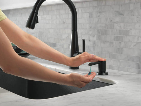 Essa Kitchen Faucet Soap Dispenser Accessory Matte Black With Metal Construction, being used above kitchen sink countertop
