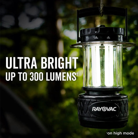 Ultra Bright LED Camping Lantern With 300 Lumens Battery Powered Water Resistant Emergency Light hanging in forest