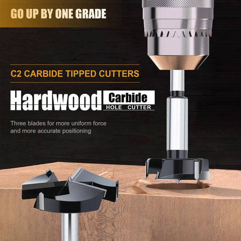 Top Tier 5 Piece Carbide Tipped Forstner Drill Bit Set Featuring Triple Flute Tungsten Steel Construction Cuts Like Butter For Clean Wood Holes From One To Four Inches Built Tough For Demanding Workshop Jobs, displaying carbide tip and blades on a wooden surface.