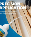 Close-up of a tube of welding high-strength super glue with precision application tip on wooden planks
