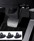 Image of installed brake pedal with black rubber pad and light switch stoppers. 4 Piece Brake Pedal Pad And Light Switch Stopper Set Black Rubber Car Replacement Pads.