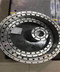 Heavy Duty Precision Cross Roller Bearing For Robotic Arms And Custom Rotary Tables, showing multiple steel rings for angular positioning.