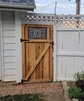 Wooden garden gate with 8 Inch T Strap Barn Door Hinges Heavy Duty Gate Hinge Set Black Wrought Iron Rustproof 6 Pcs, installed.