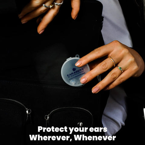 High Fidelity Earplugs 19dB Noise Reduction For Musicians And Showgoers Large Fit in protective case held by hands