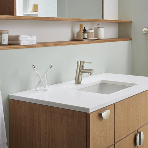 Concetto Single Hole Bathroom Faucet With Single Handle S Size Brushed Nickel installed on modern bathroom vanity