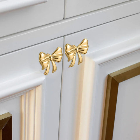 Dang Stylish Gold Bow Cabinet Handles Eight Pack Plus Heavy Duty Screws Easy Install Drawer Knobs For Dressers And Cabinets on white cabinet.